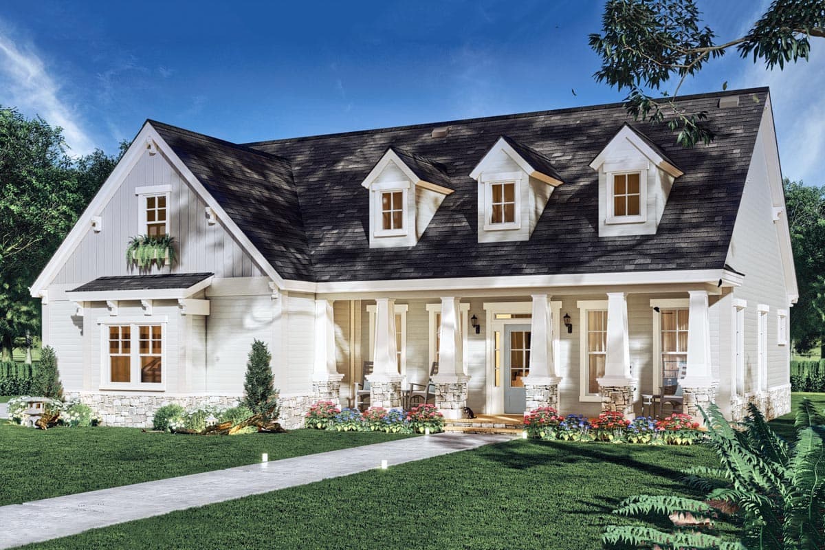House plan exterior, a one-and-a-half story home with a gabled front, a covered porch supported by columns, and three dormer windows.