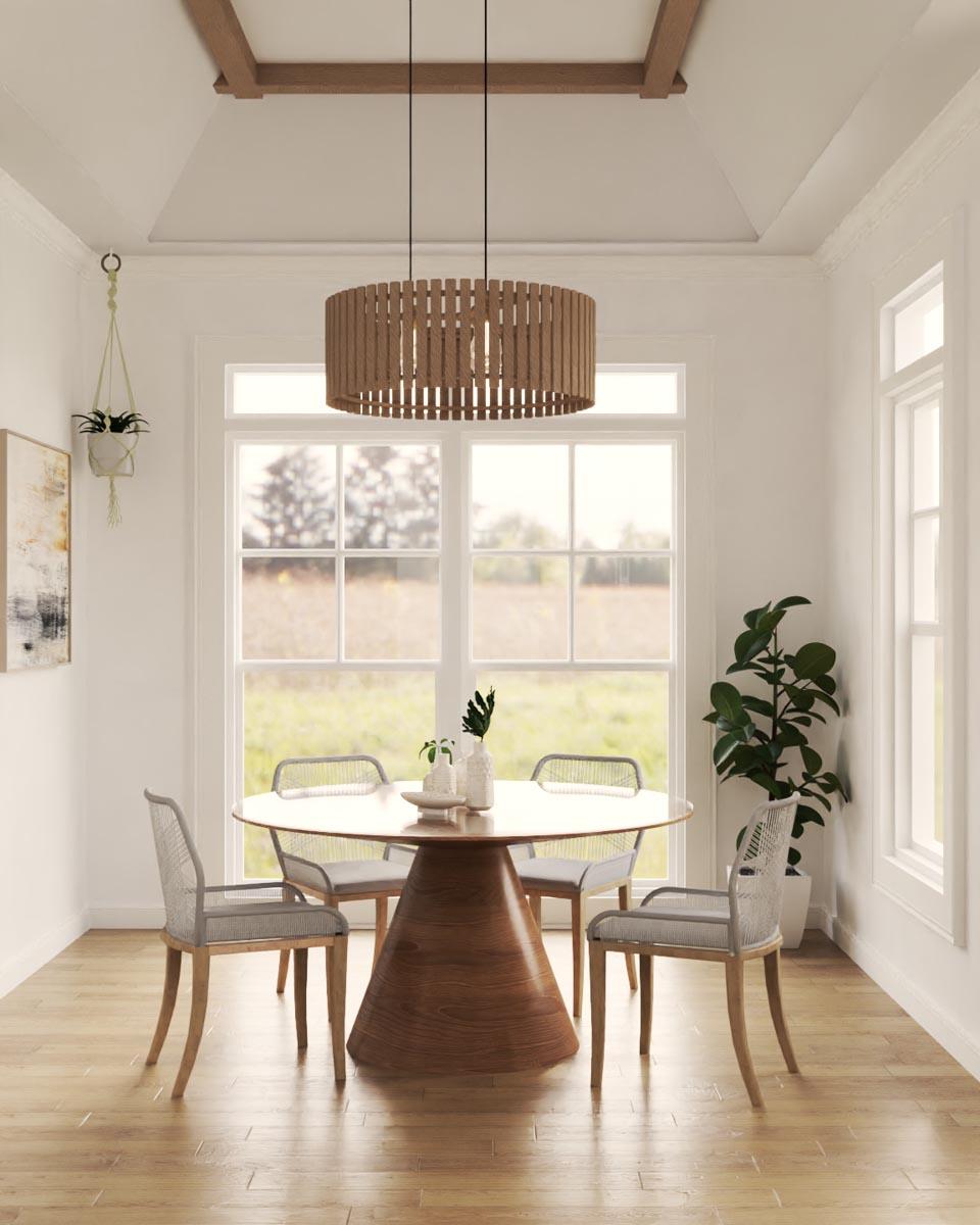 Dining room with round wooden table, four chairs, large windows, and coffered ceiling with wood beams.