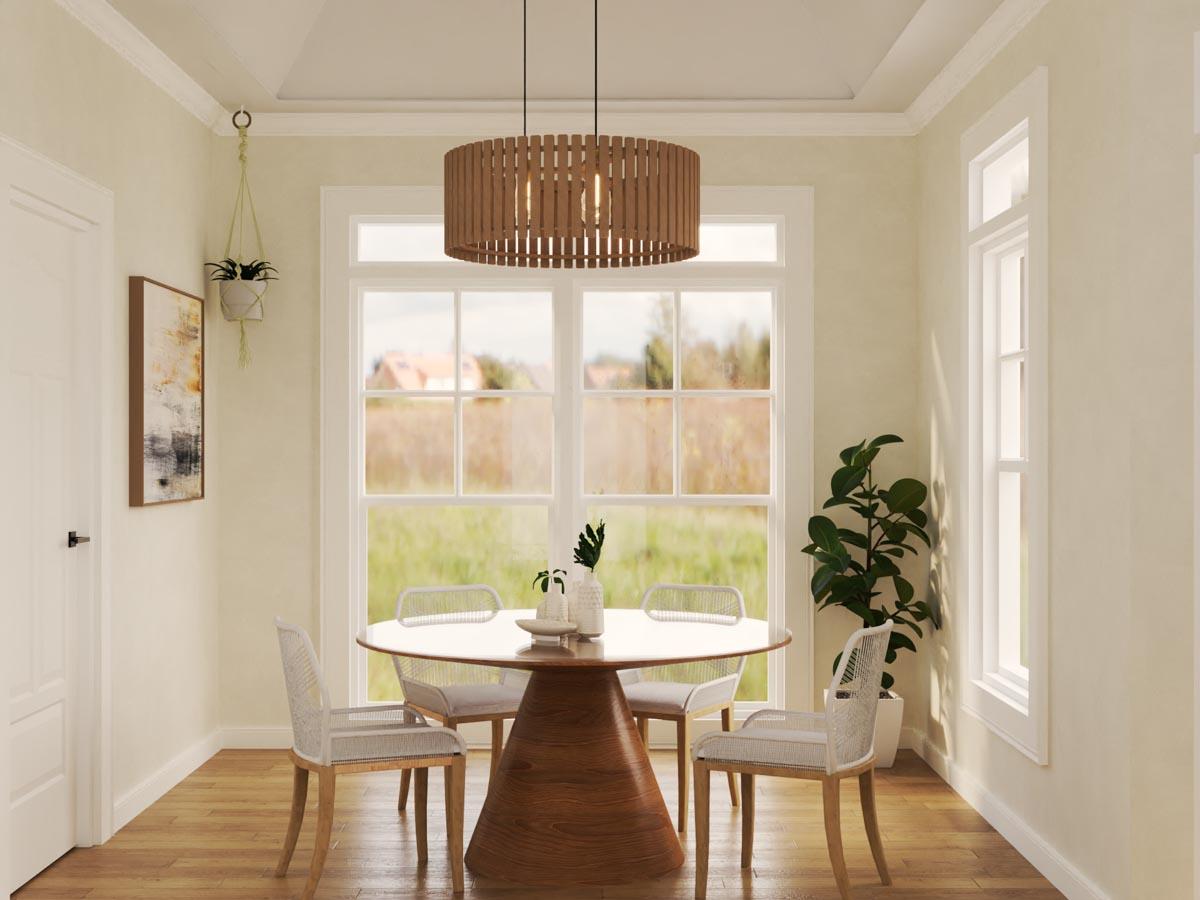 Dining room with round wood table, four chairs, large windows, and wood slatted pendant light.