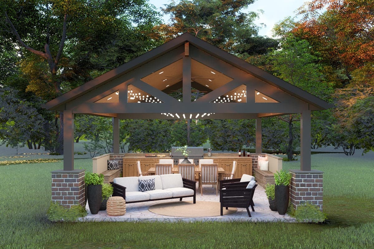 Outdoor kitchen rendering with a gabled pavilion roof. Features include seating, dining area, built-in cabinetry, and string lights.