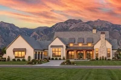 Triple Dormered Modern Farmhouse Under 4000 Square Feet with 3-Car Garage