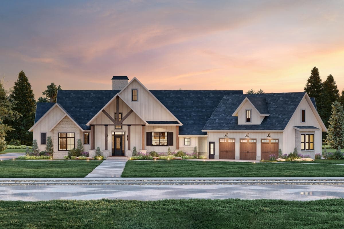Modern Farmhouse house plan exterior with a prominent gabled entry, stone accents, and a three-car garage.