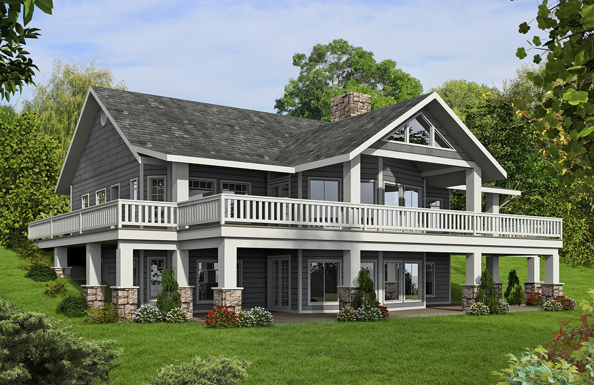 House plan exterior: Modern home with a wraparound deck, stone-clad foundation pillars, and prominent gables.