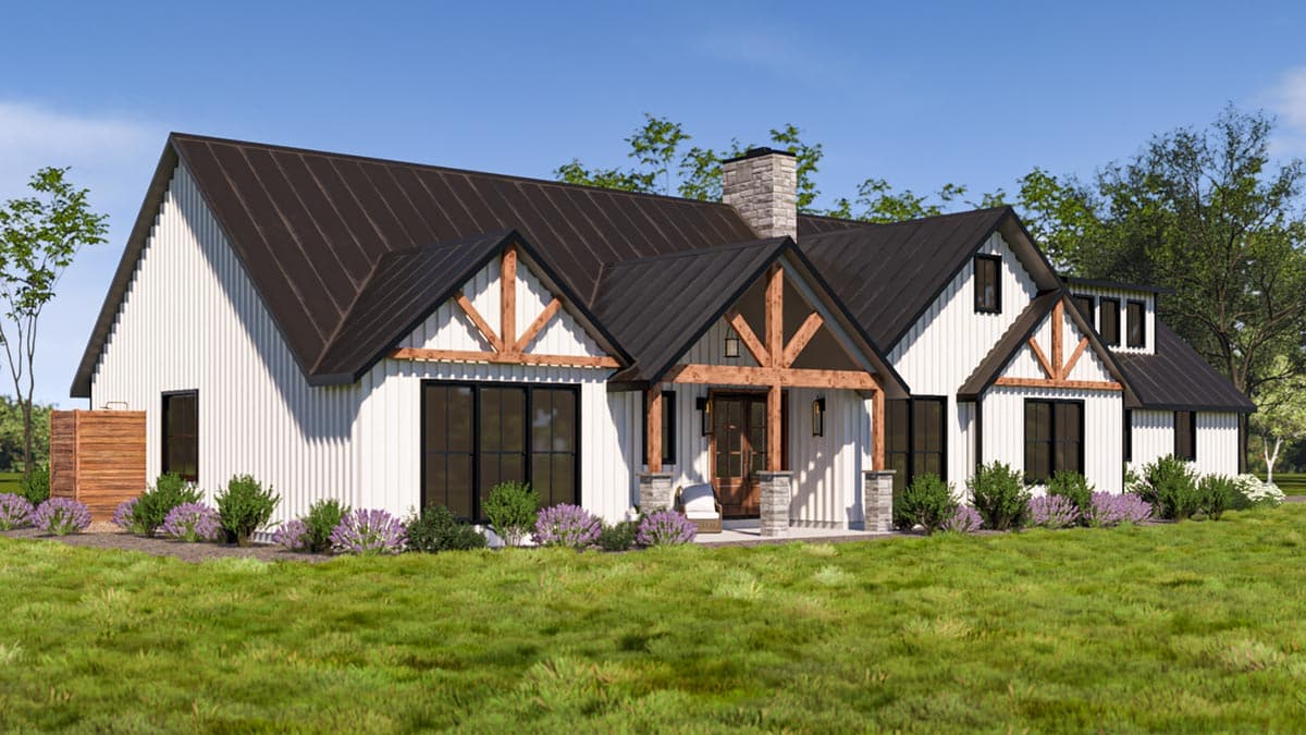 House plan exterior: Modern Farmhouse style, white vertical siding, black metal roof, gables with timber accents, stone chimney, covered porch.