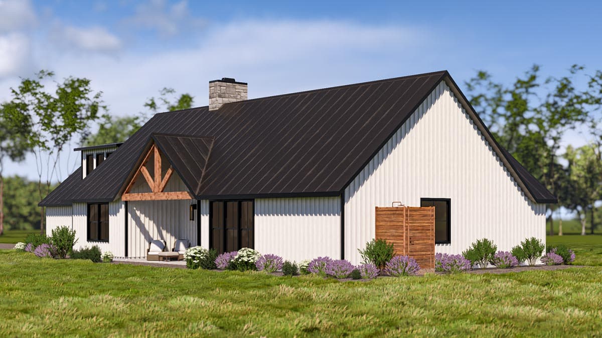 Modern Farmhouse house plan exterior with white siding, dark metal roof, stone chimney, wood beams on porch, and gabled dormer.
