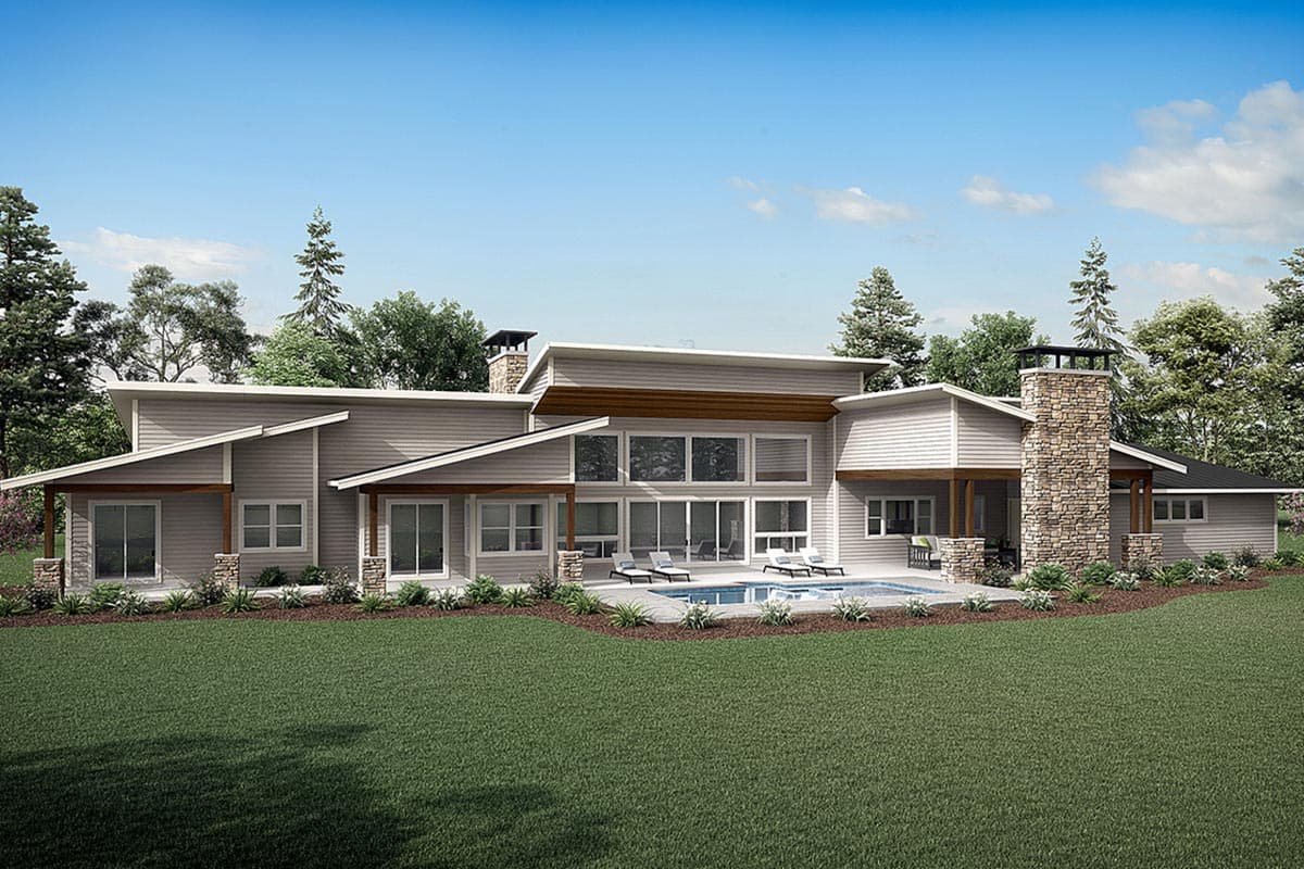 Modern house plan exterior with multiple gables, extensive windows, stone chimney, and covered patio with pool.