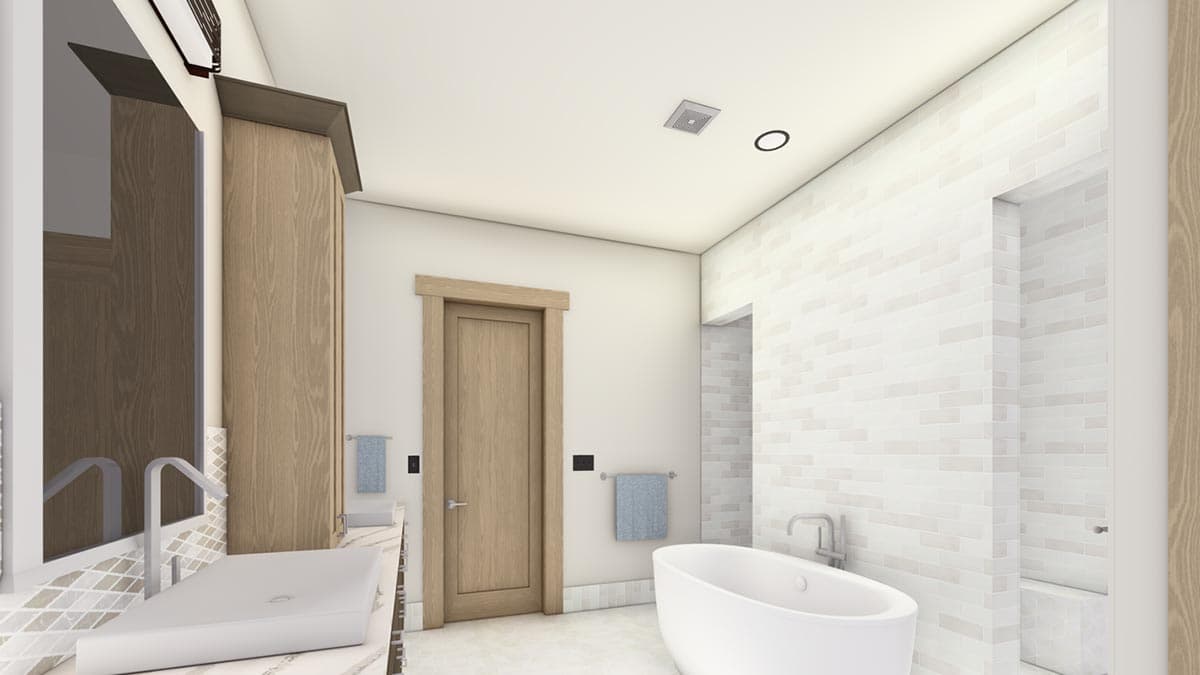 A modern bathroom showcases a freestanding tub and a sink area with a large mirror and wooden cabinet. Light-colored brick tile on a wall.