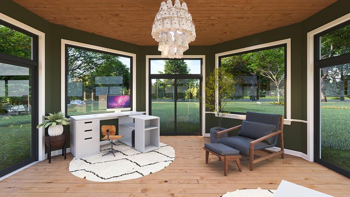 Home office with white desk, chair, and ottoman. Features large windows, wood ceiling and floors.