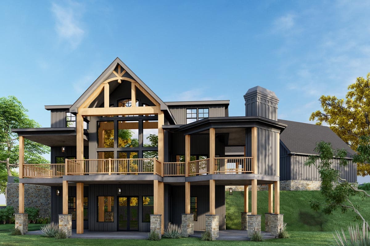 Modern farmhouse house plan exterior with timber framing, expansive windows, covered decks, and stone accents.