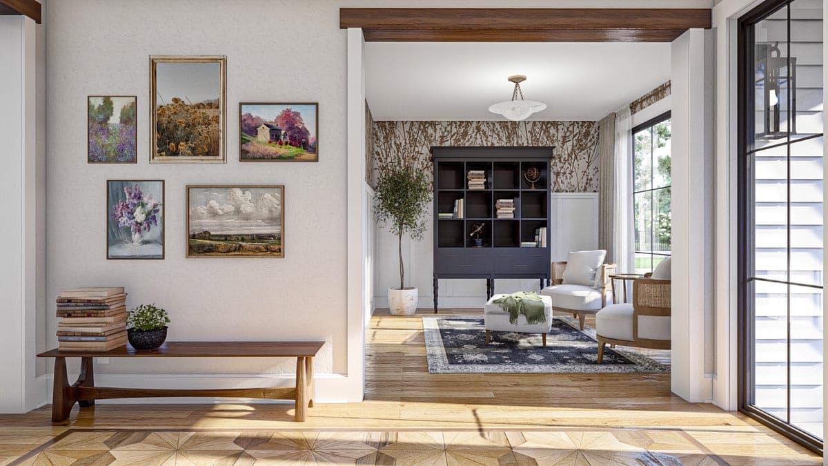 Interior view showing a living area with a dark cabinet, patterned wallpaper, and seating.