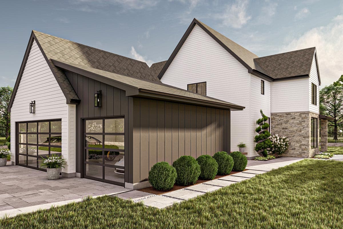 Modern Farmhouse house plan exterior with two garage bays, white siding, stone accents, and prominent gables.
