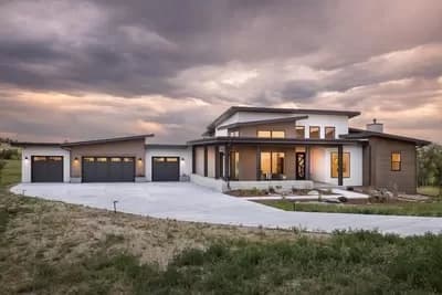 Mid-Century Modern House Plan Under 3000 Square Feet with 4-Car Garage