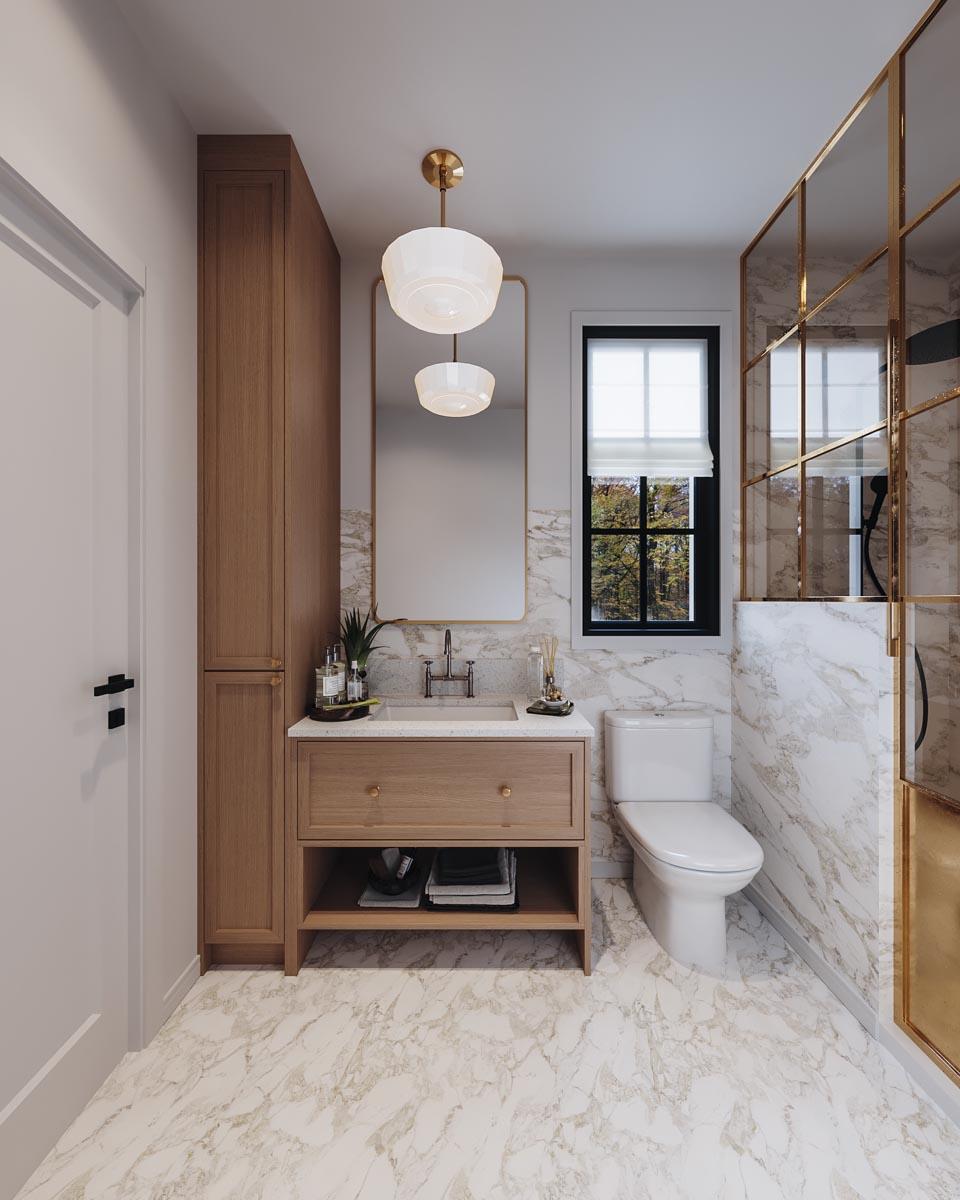 Bathroom with marble tile, wood vanity, gold-framed shower enclosure, and window.