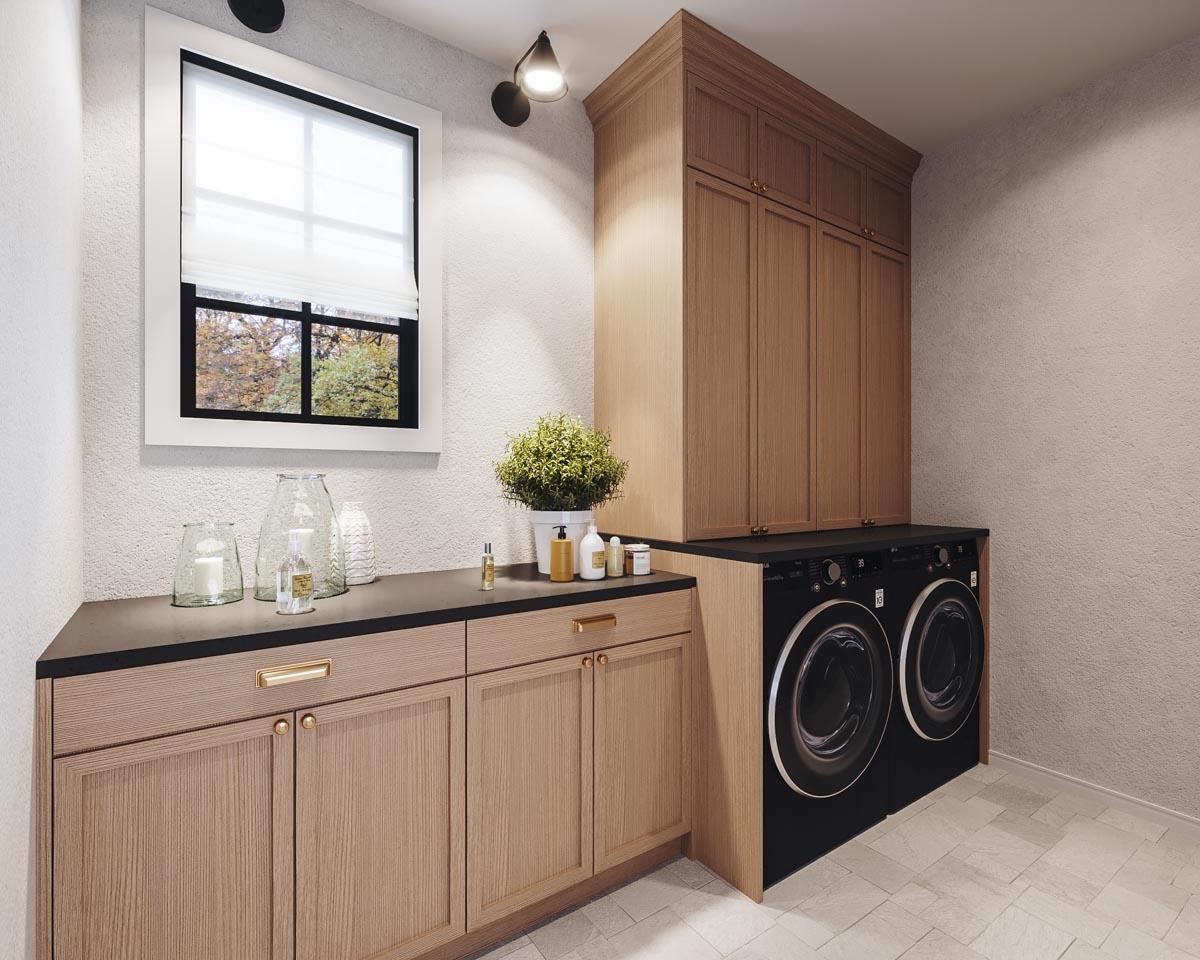 Laundry room with modern wood cabinetry, black front-load washer and dryer, and a window with white Roman shade.