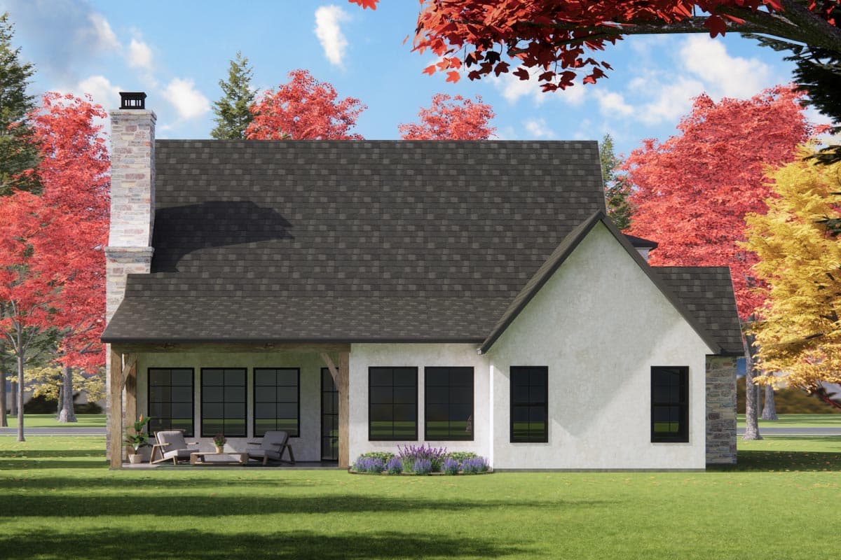 House plan exterior: One-story modern farmhouse with covered porch, stone chimney, gable roof, and large windows.