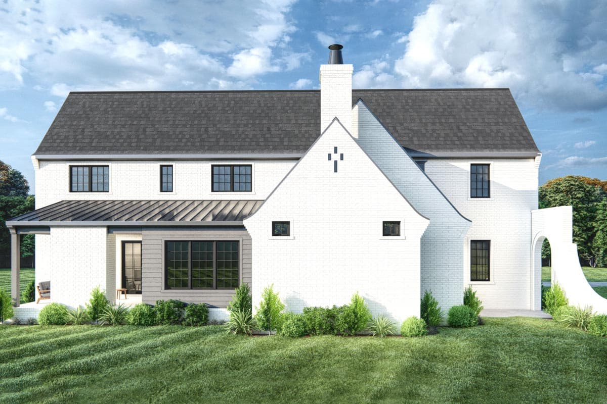 House plan exterior of a two-story white brick home with gabled roof, metal porch roof, prominent chimney, and arched walkway.