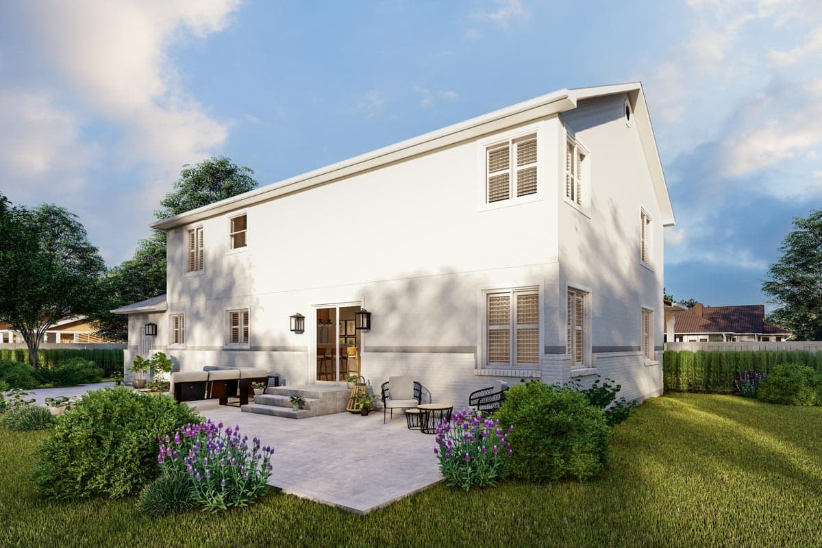 House plan exterior: two-story modern design with stucco finish, large windows, sliding glass doors, and a patio.