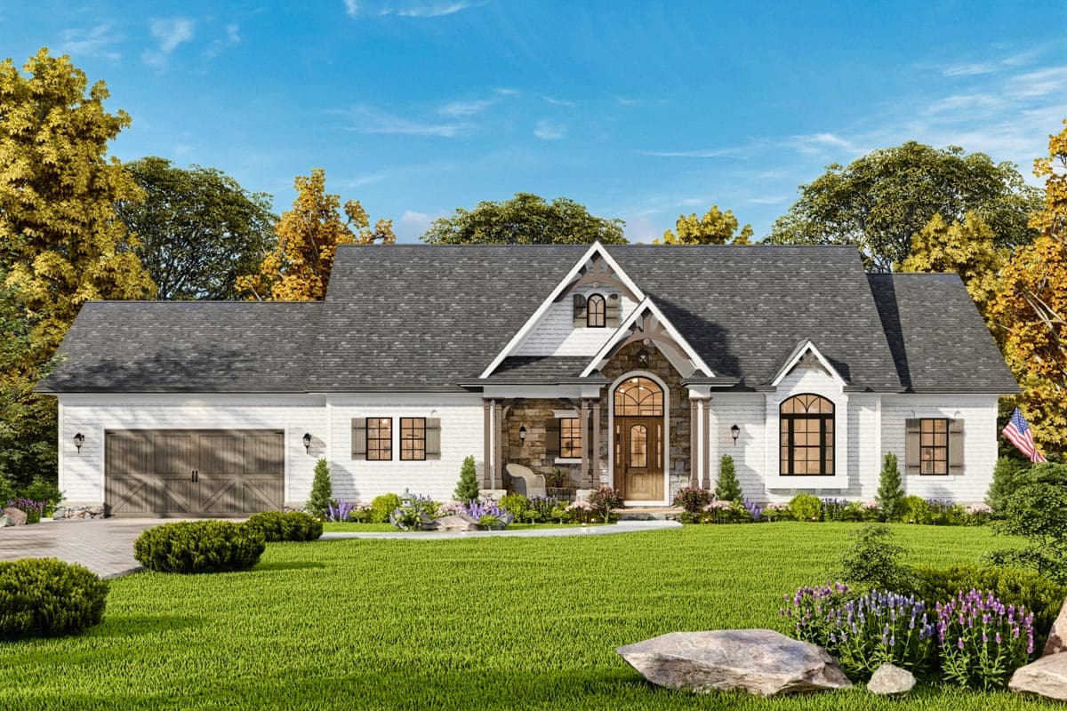 House plan exterior: Ranch style, 1 story, with stone accents, gabled entrance, dormers, and side-entry garage.
