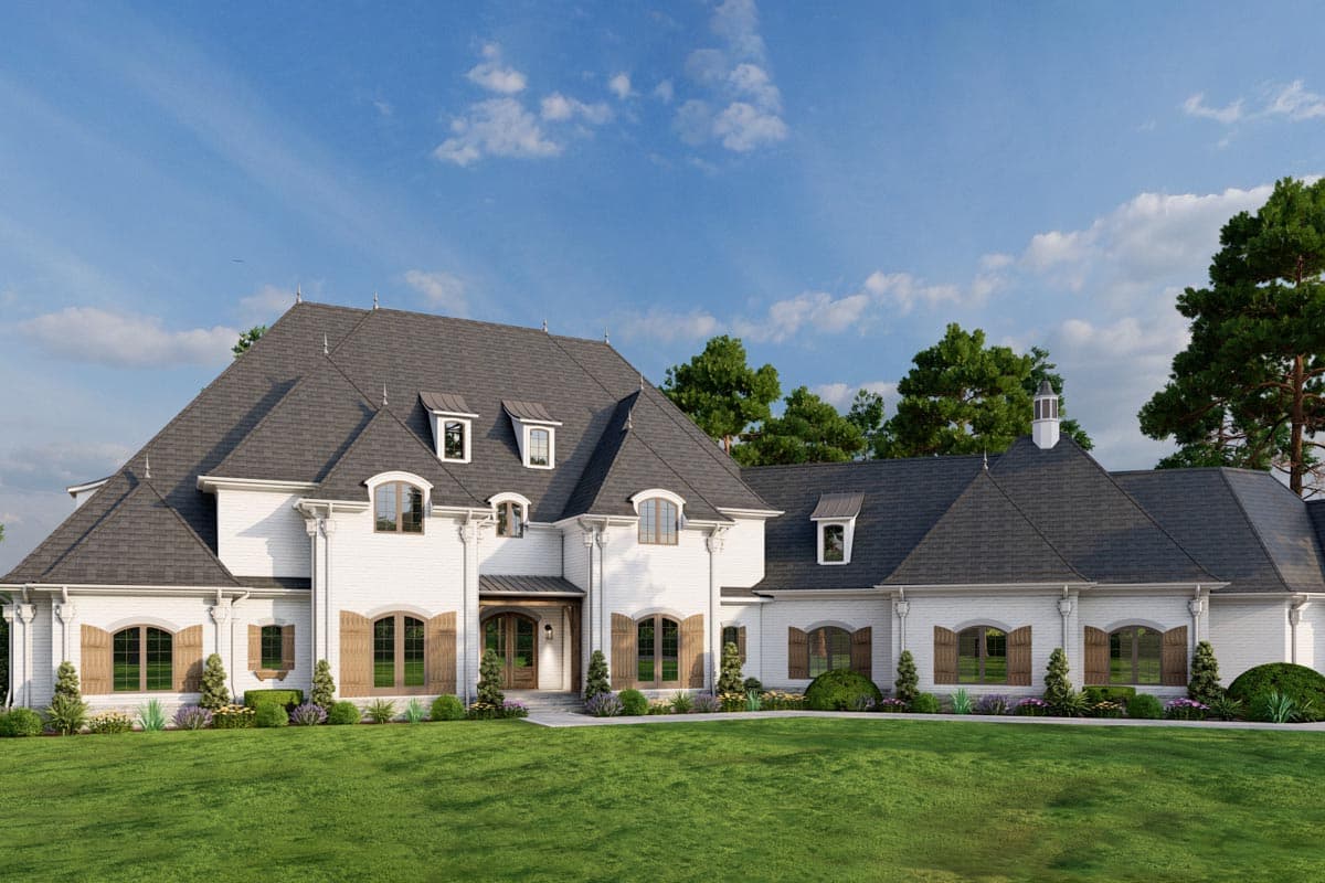 House plan exterior: French Provincial style, multi-level, white brick facade, mansard roof, dormers, and arched windows with shutters.