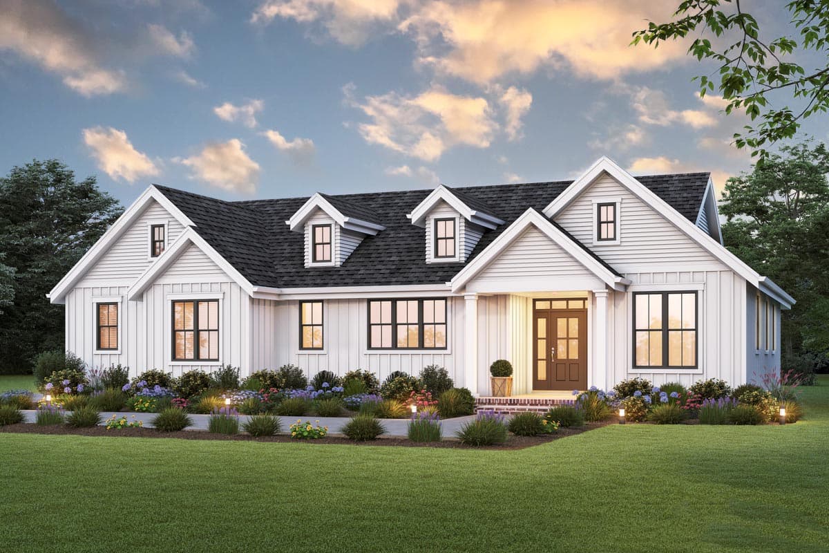 House plan exterior. Modern Farmhouse style, two stories. Features include multiple gables, dormers, and a covered front porch.