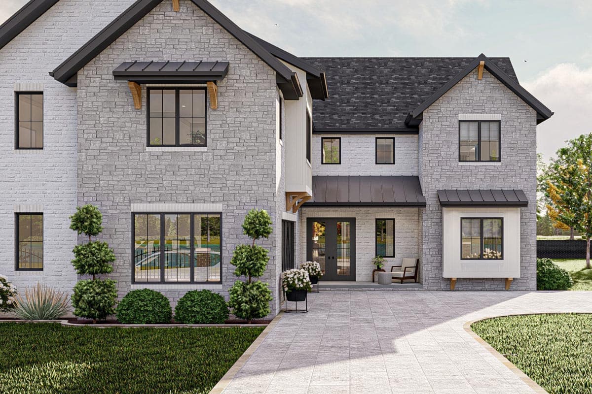 House plan exterior: Two-story modern farmhouse with stone facade, gable roof, metal awnings, and double entry doors.