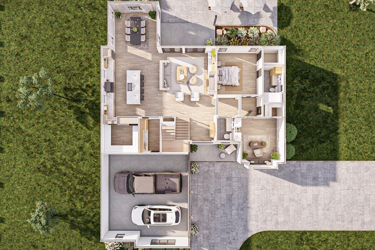 Aerial view of a house plan showing an open layout with kitchen island, living area, dining patio, and attached two-car garage.