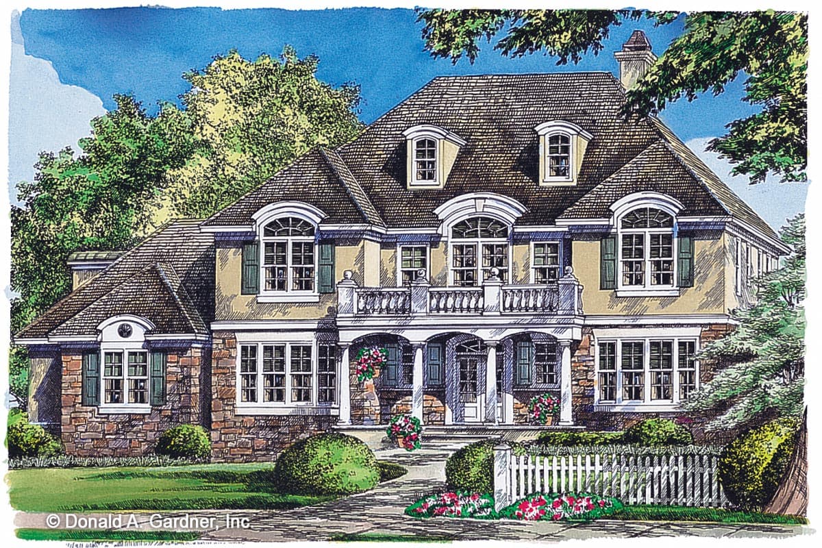 House plan exterior: Traditional style, two stories, prominent second-story balcony, arched dormers, stone accents.