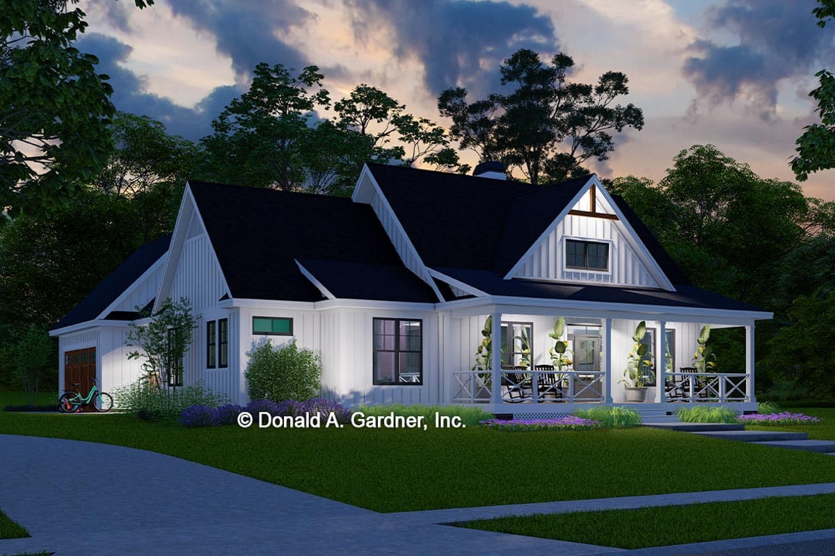 Modern Farmhouse style house plan exterior with a wraparound porch, gables, and a side-entry garage.