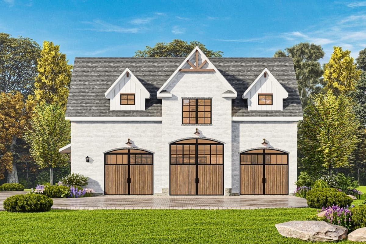 House plan exterior. Two-story, Modern Farmhouse style with three garage doors. Features include dormers, gables, and a prominent roofline.