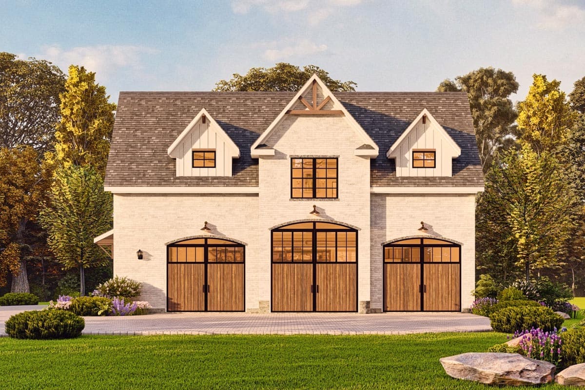 House plan exterior showing a two-story Modern Farmhouse with three garage bays, gable dormers, and arched garage doors.