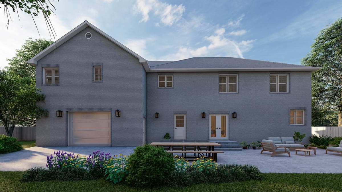 House plan exterior: two-story brick home with attached garage, gable roof, and rear patio with seating.