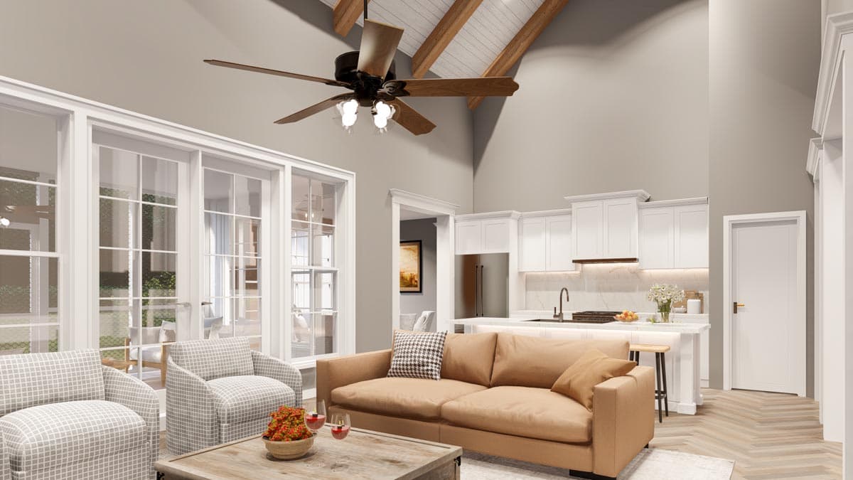 Interior rendering of an open concept living area and kitchen with vaulted ceilings, exposed beams, and large glass doors.