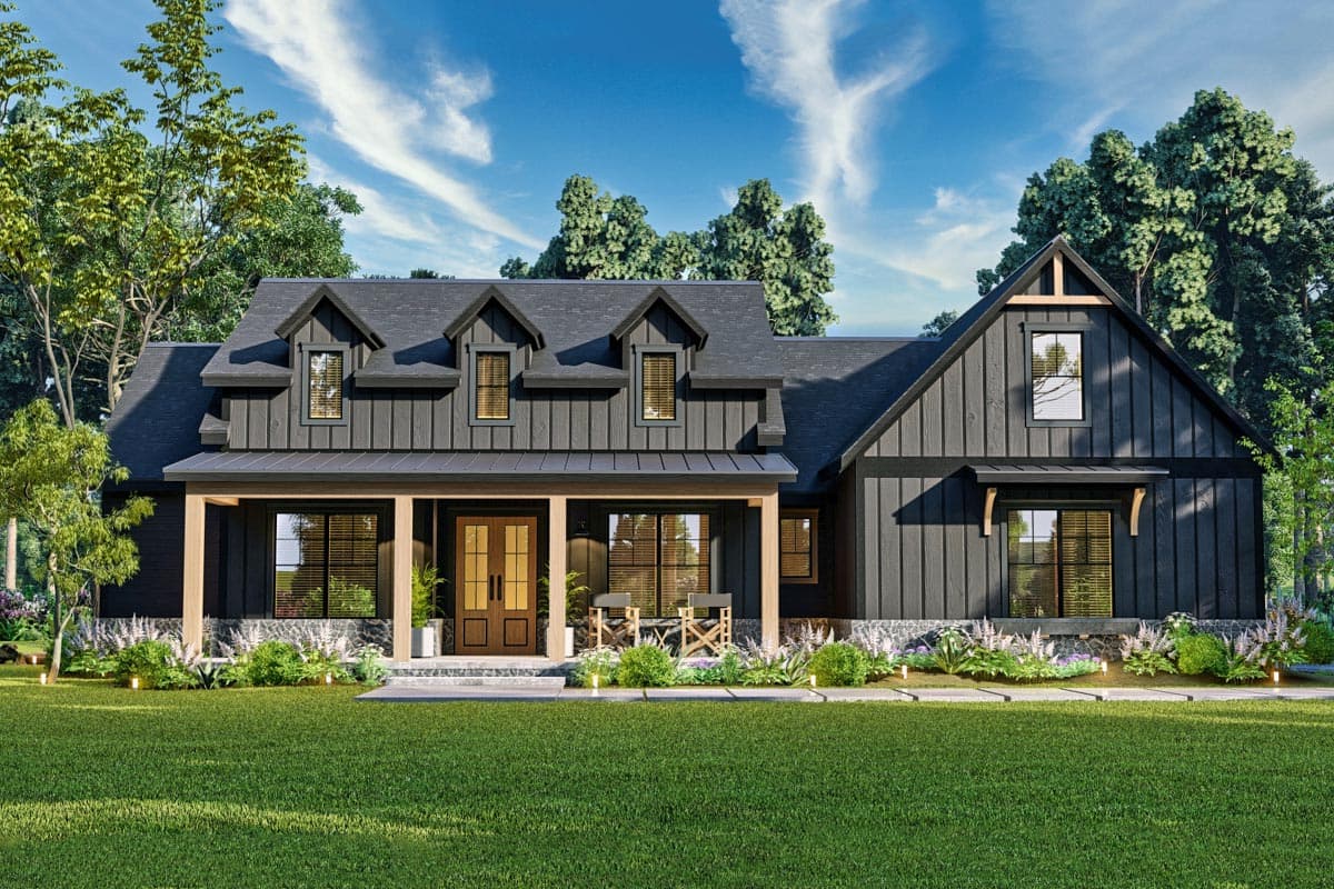 House plan exterior. Modern Farmhouse with a front porch, multiple dormers, and gabled rooflines. Two-story structure with board-and-batten siding.