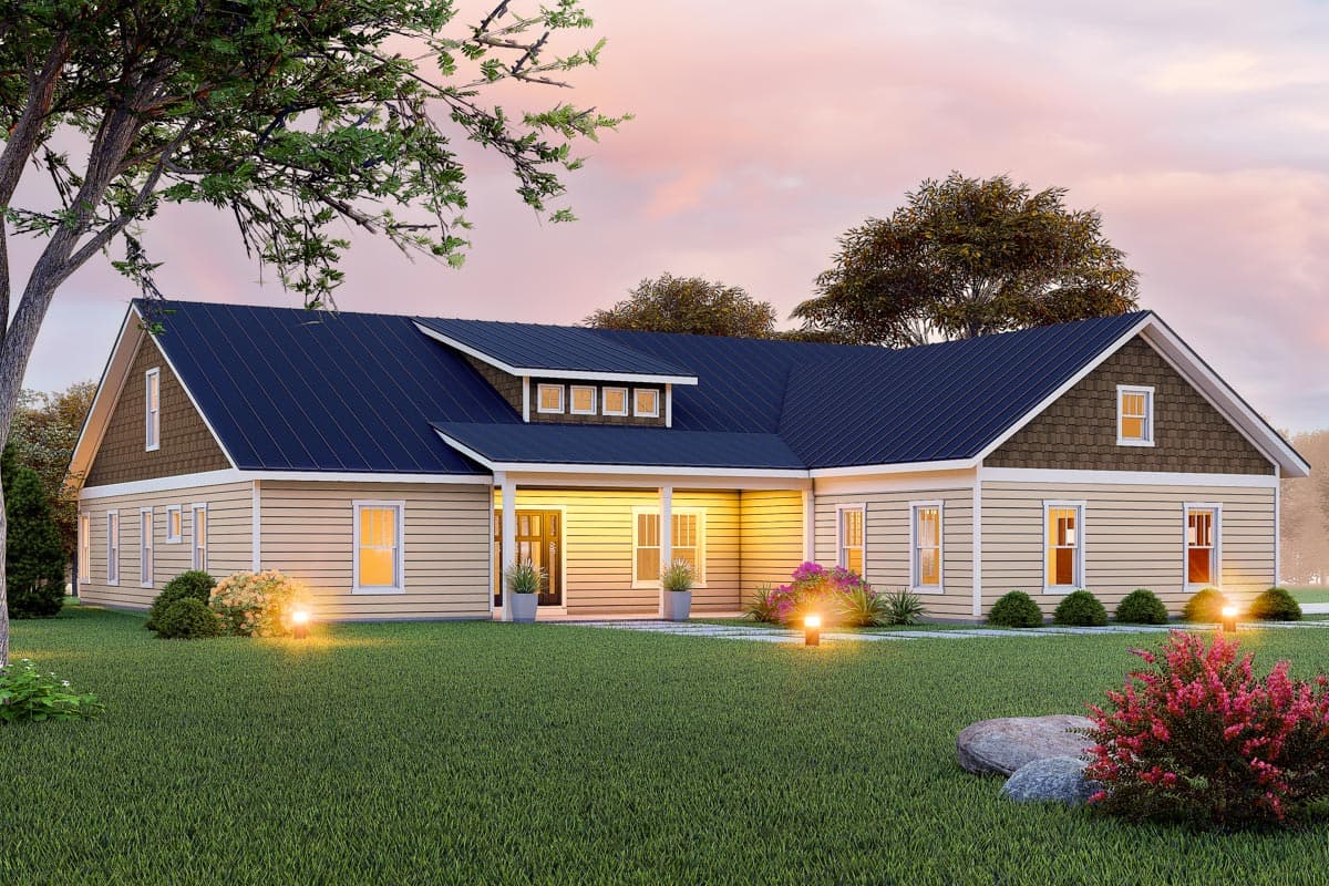 House plan exterior. Ranch-style home with a single story, front porch, shed dormers, and a gabled roof with a dark metal finish.