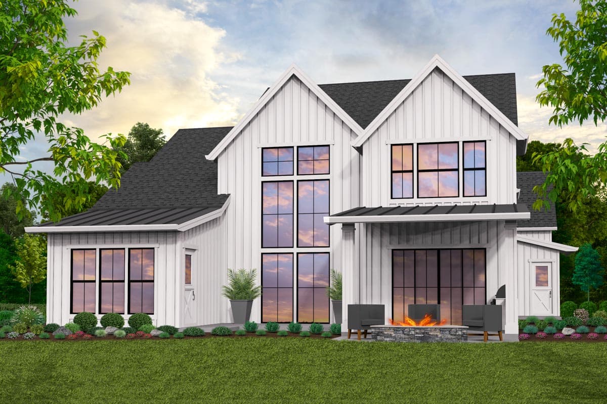 Modern Farmhouse house plan exterior with board-and-batten siding, gabled roofs, and large grid windows.