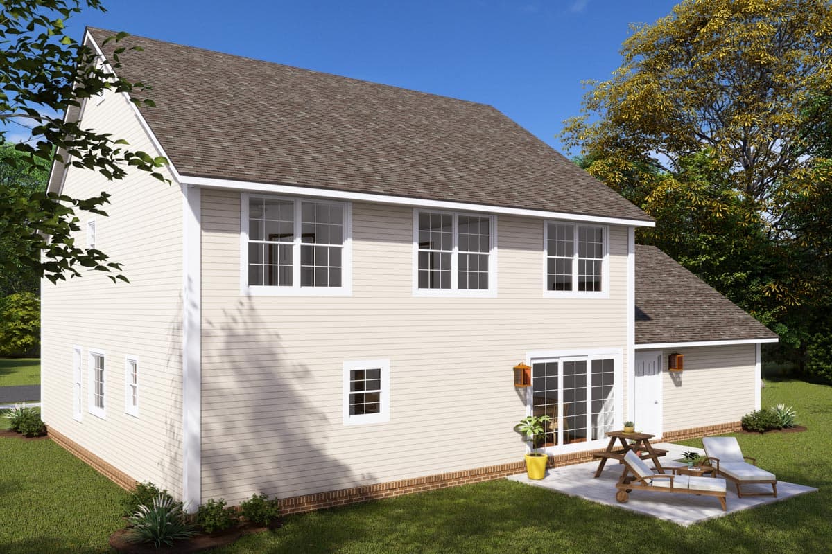 House plan exterior: Two-story home with neutral siding, multiple gable rooflines, and a sliding glass door leading to a patio with outdoor furniture.