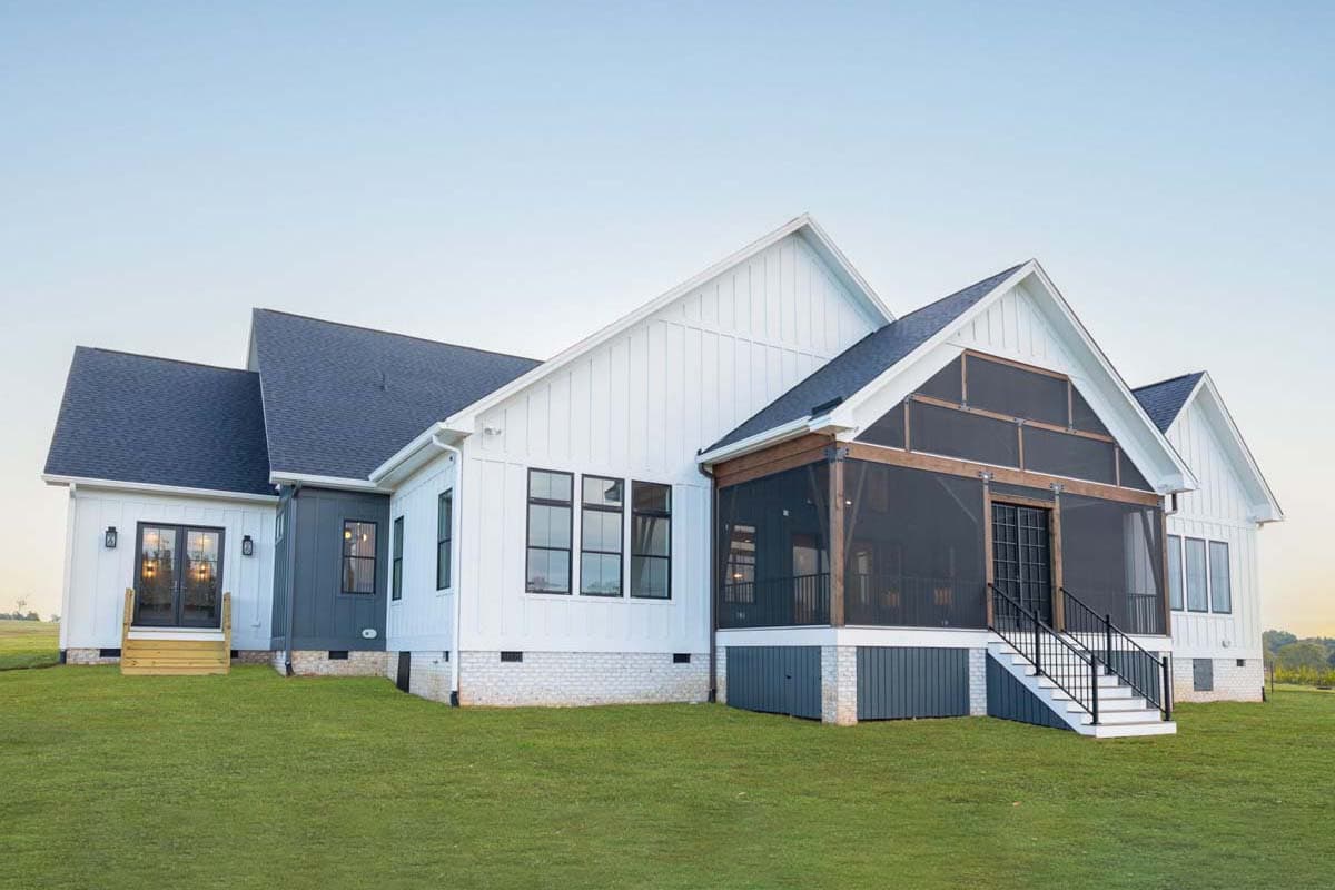 Modern Farmhouse house plan exterior with board and batten siding, gables, and a screened porch.