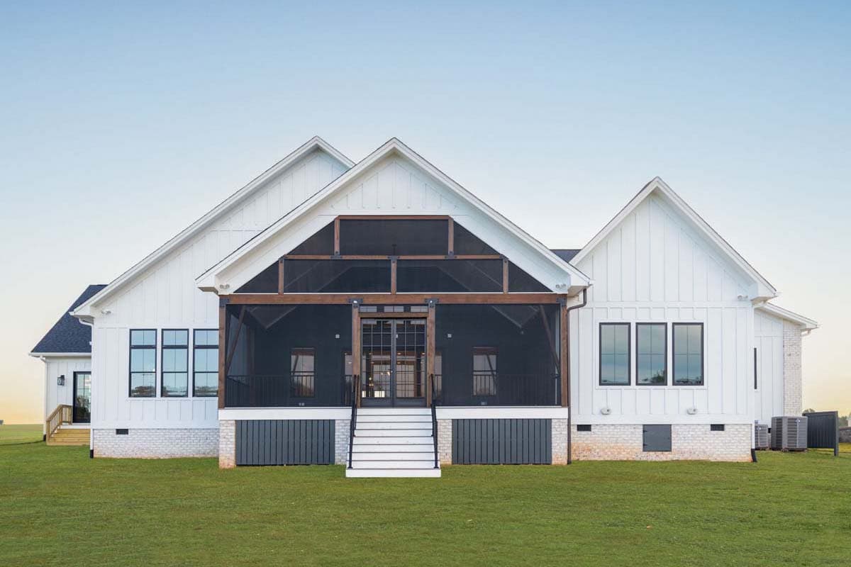 Modern Farmhouse house plan exterior with gabled rooflines, a screened porch with wood beams, and board and batten siding.