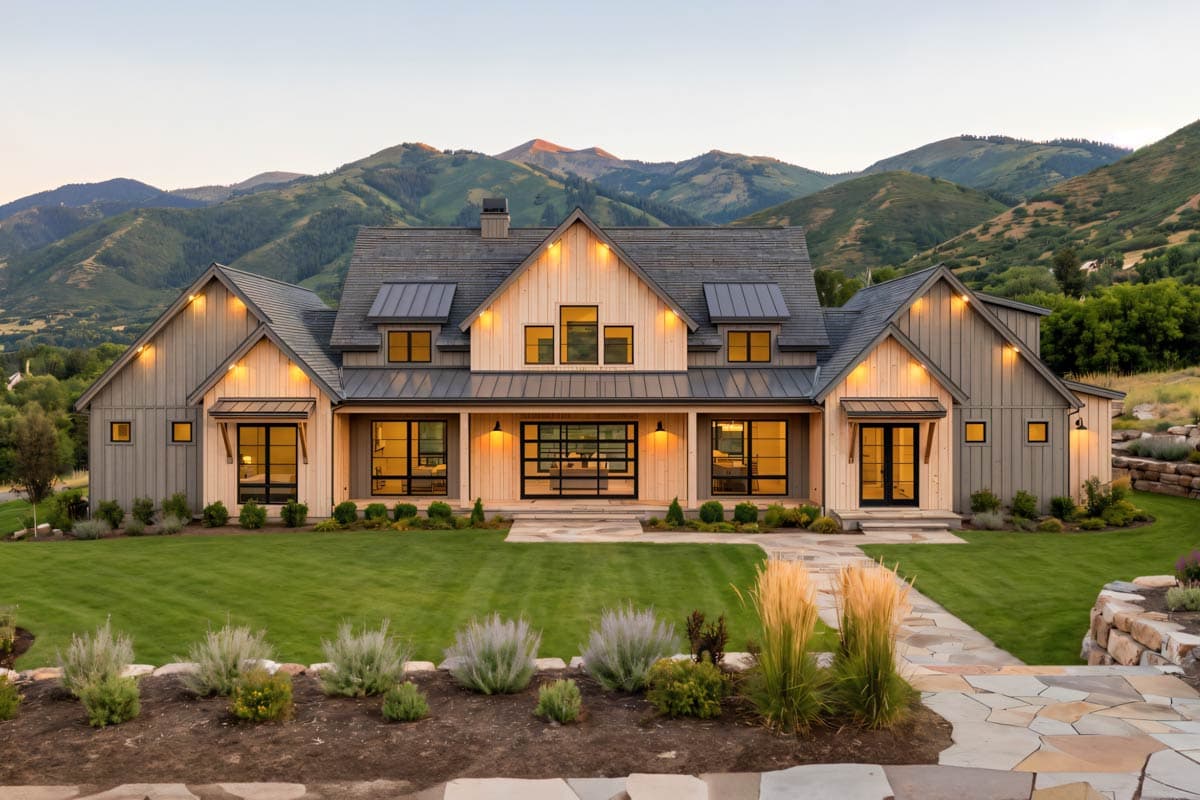 Modern Farmhouse exterior with gabled dormers, a central cross-gable, and a covered porch with glass garage door.