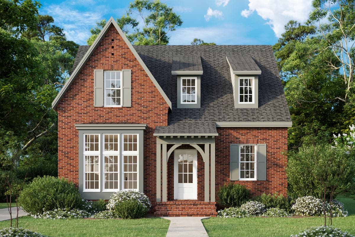 House plan exterior with brick facade, front porch, and dormers. Features a gabled roof and multiple windows with shutters.