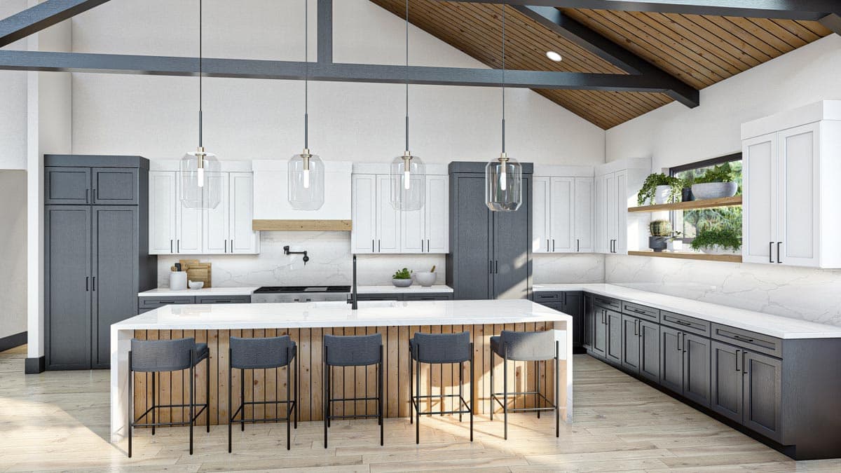 A modern kitchen with contrasting white and gray cabinets, a large island with bar stools, and pendant lights hanging from a vaulted ceiling.