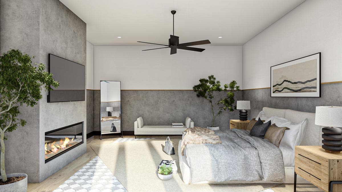 Modern bedroom with a fireplace, TV, and large bed. Features include a ceiling fan, artwork, and a bench. Plants and decor add a natural feel.