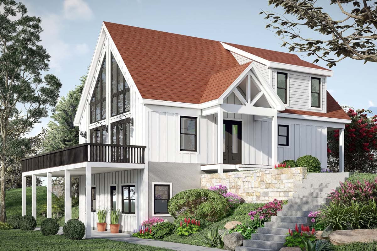 House plan exterior. Two-story farmhouse with a gable roof, covered porch, and a balcony. Features include large windows and a stone accent wall.