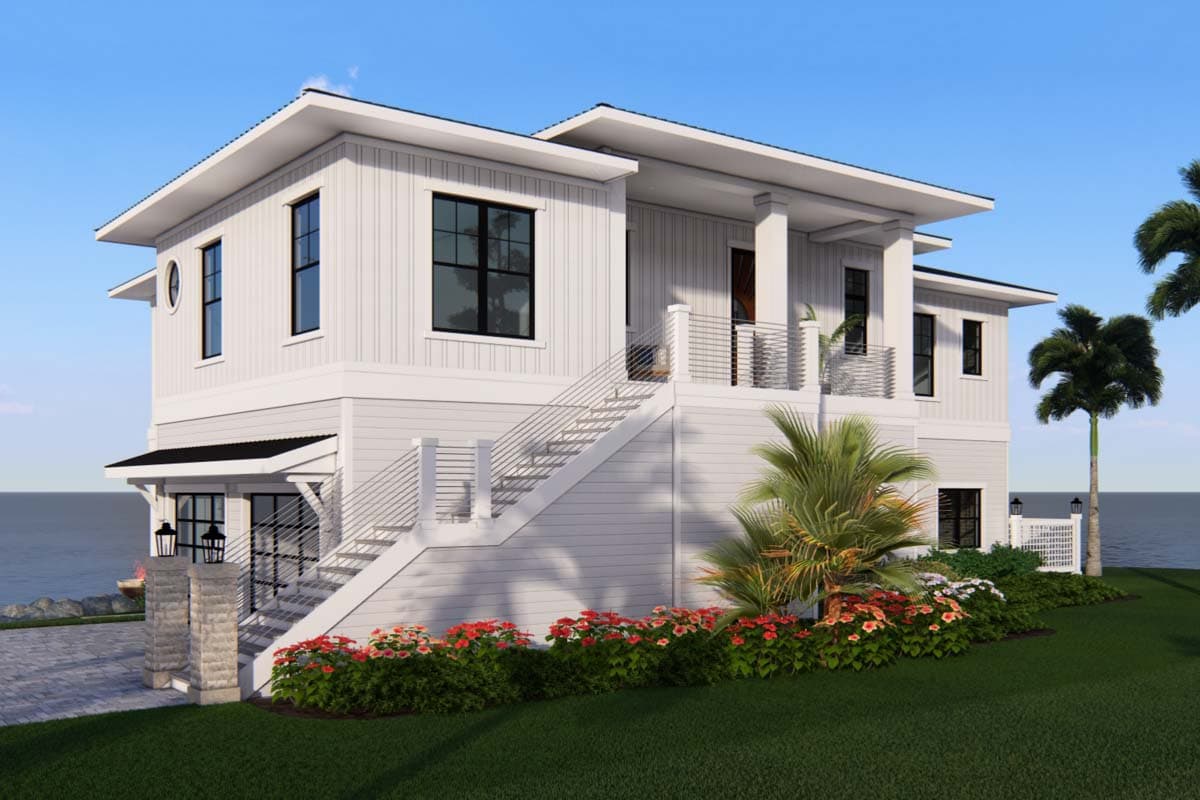House plan exterior: two-story Modern Coastal style with elevated main living, wide stairs, balcony, and board-and-batten siding.