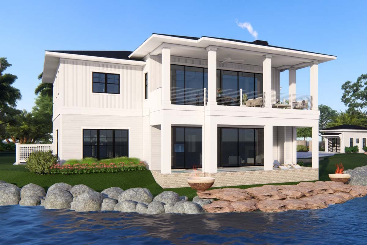 Modern two-story house plan exterior with a prominent upper-level balcony, large windows, and board and batten siding.