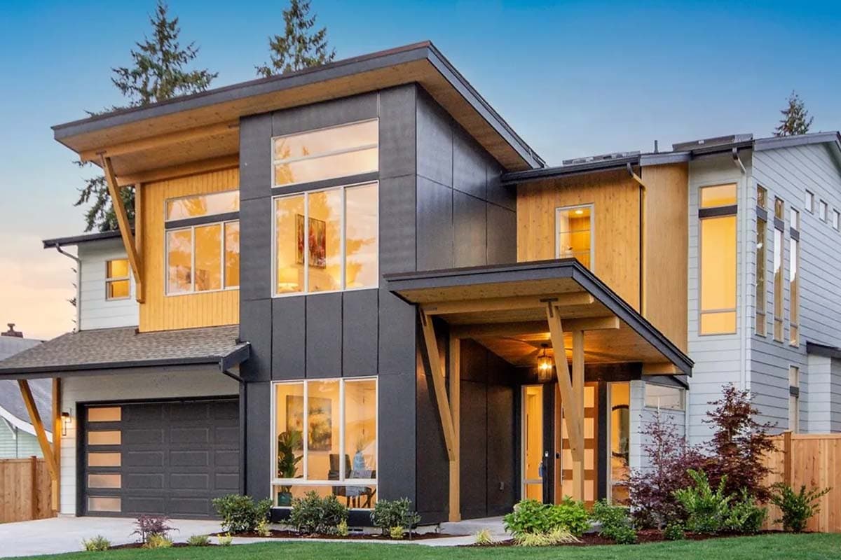 Modern two-story house plan exterior with angled wood supports, large windows, dark cladding, and a side-entry garage.