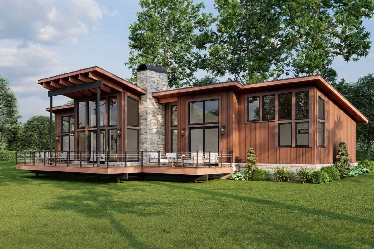 Modern house plan exterior with wood siding, stone chimney, expansive windows, and wrap-around deck.