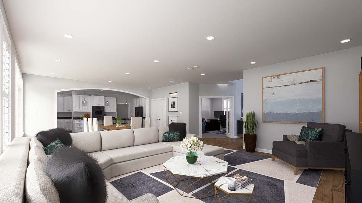 Rendering of an open-concept living area with sectional sofa, coffee table, and view into a modern kitchen and home office.