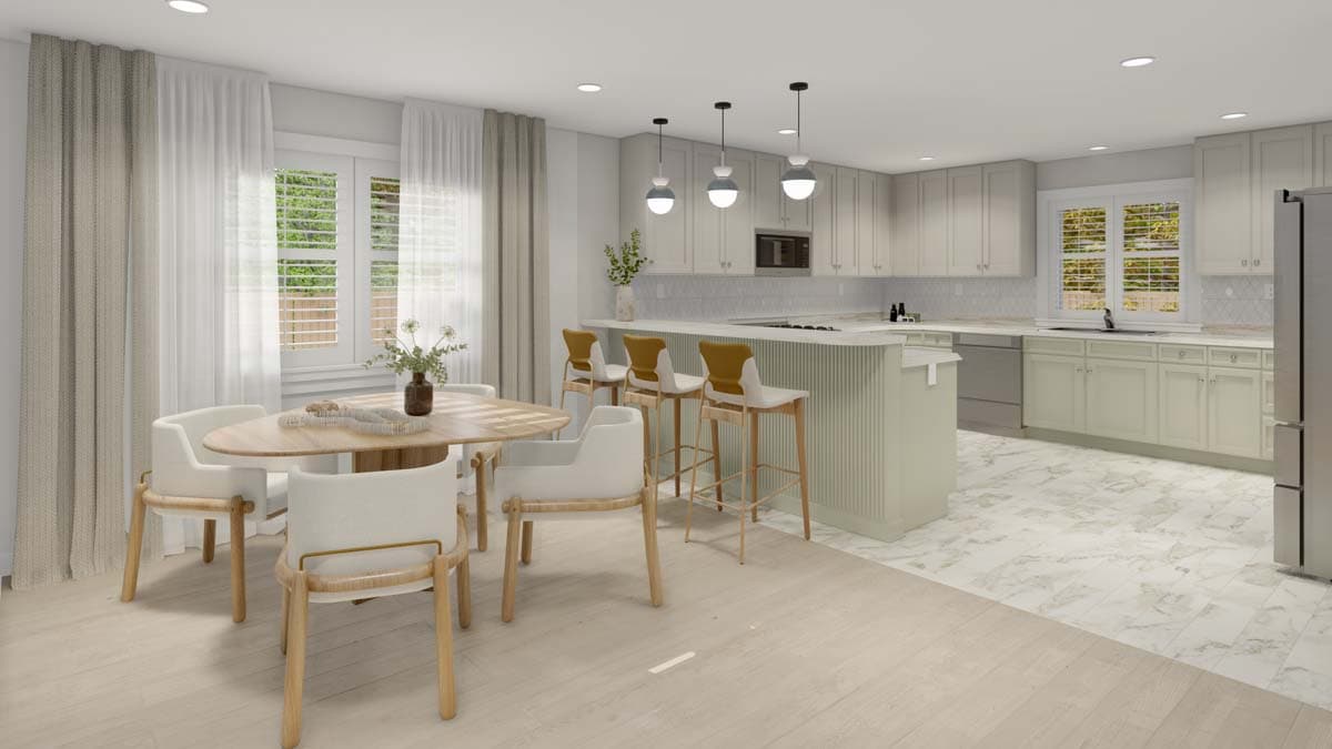 Kitchen and dining area with island, bar stools, dining table, and light-colored cabinetry.