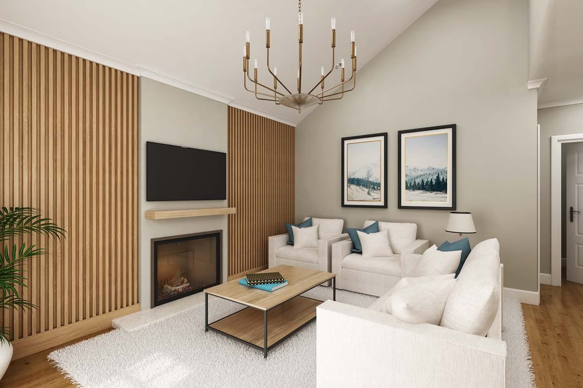 Living room with vaulted ceiling, fireplace, slatted wood accent wall, and modern chandelier.